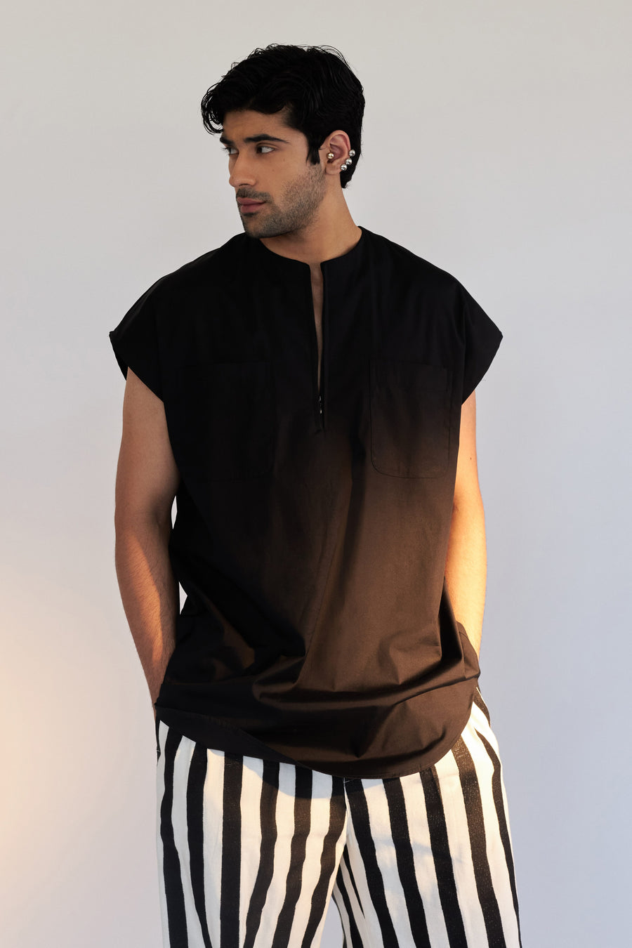 ROSANI The Armis t-shirt in black, detail of invisible zip and arm hole construction.