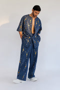 ROSANI The Atto shirt, three-quarter view. Full embellishment coverage and boxy silhouette.