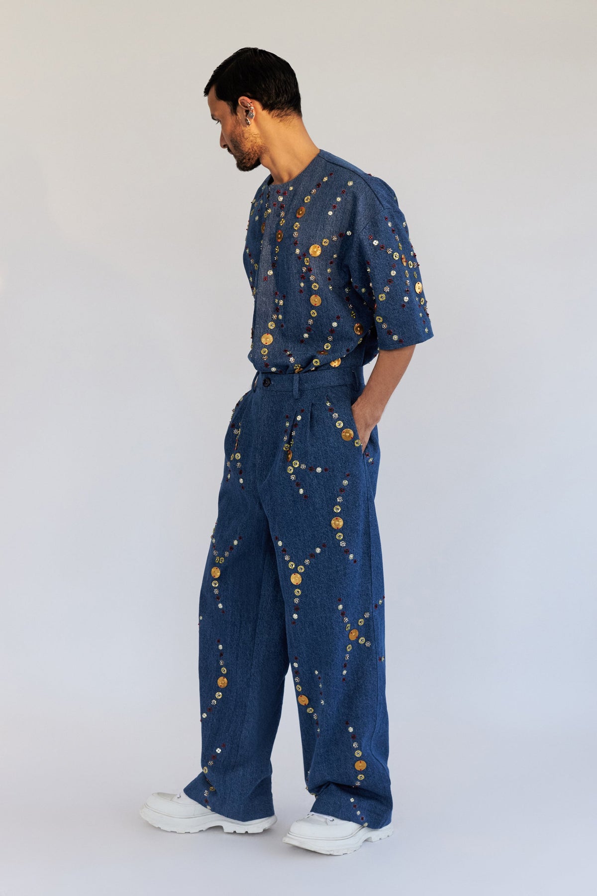 ROSANI The Enzo trouser, side view. Wide-leg denim with elasticated waist.