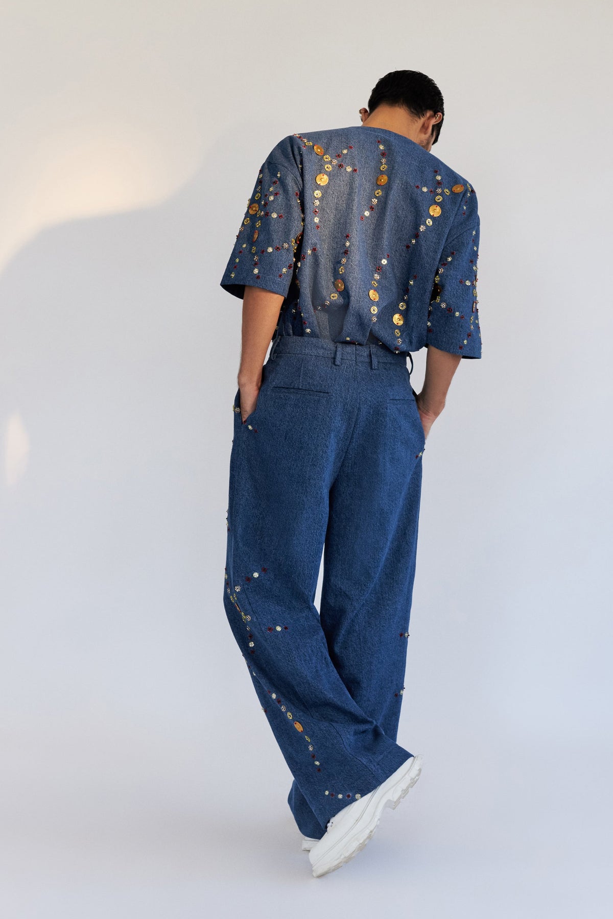 ROSANI The Enzo trouser, full-length back view. Wide-leg denim. DYMENSION collection.
