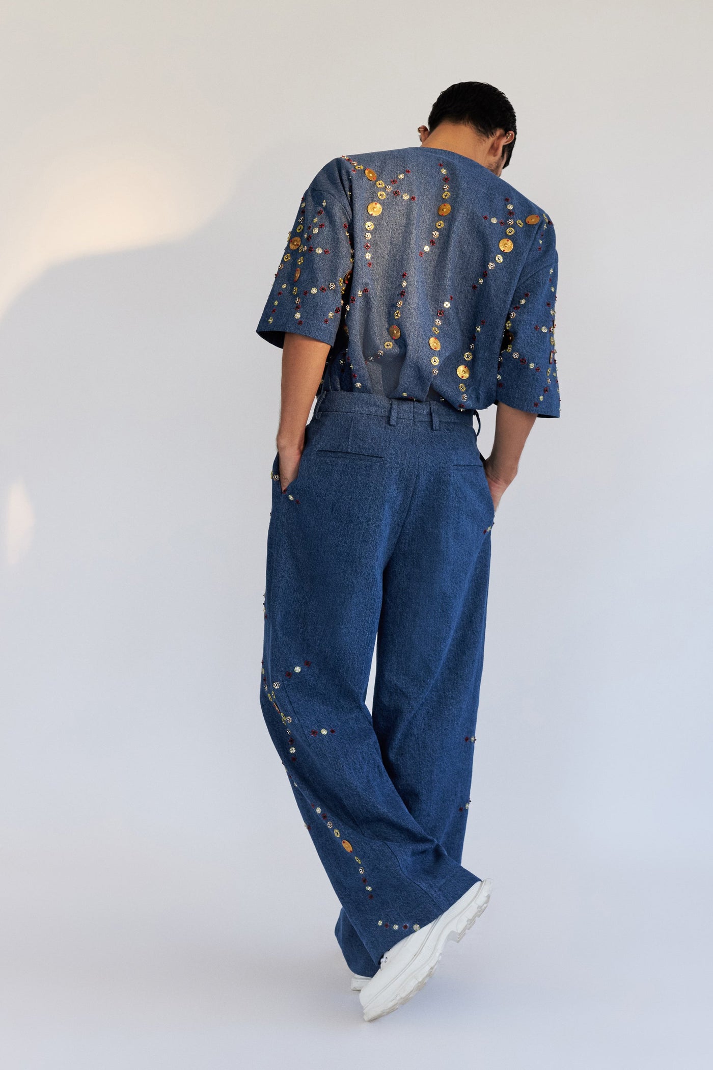 ROSANI The Enzo trouser, full-length back view. Wide-leg denim. DYMENSION collection.