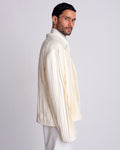ROSANI The Jesse blazer in eggshell, side view. Box-fit pleated blazer.