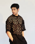 ROSANI The Riflesso t-shirt, front view. Oversized with custom laser-cut surface texture and signature shoulder zip. DYMENSION collection.