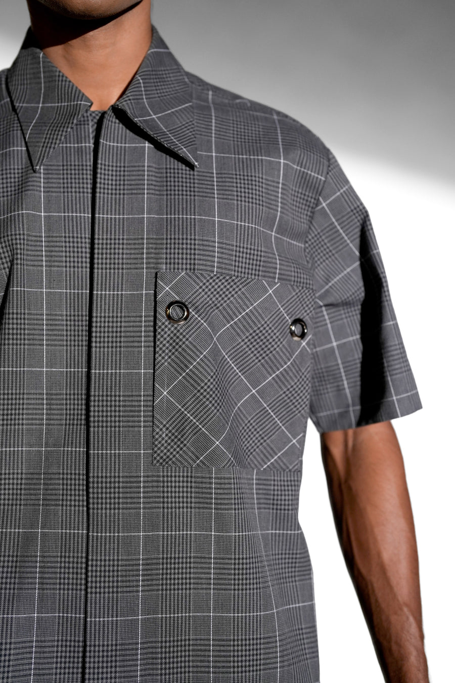 ROSANI The Capsule shirt in grey - eyelet pocket accent detail, close-up