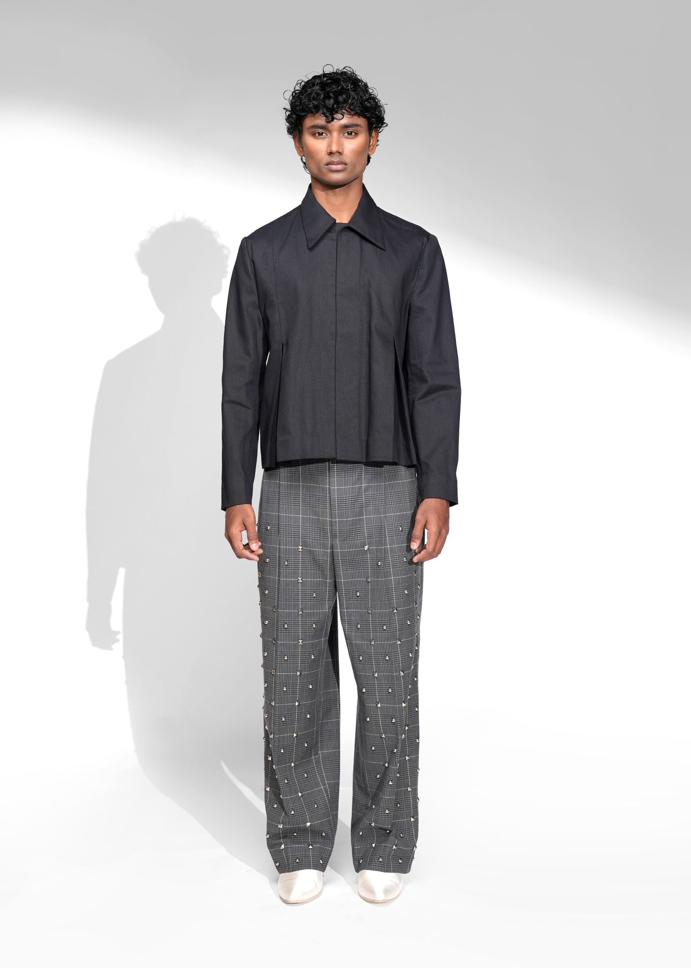 ROSANI The Dome jacket in black - cropped jacket with deep inverted box pleats on each panel, front view