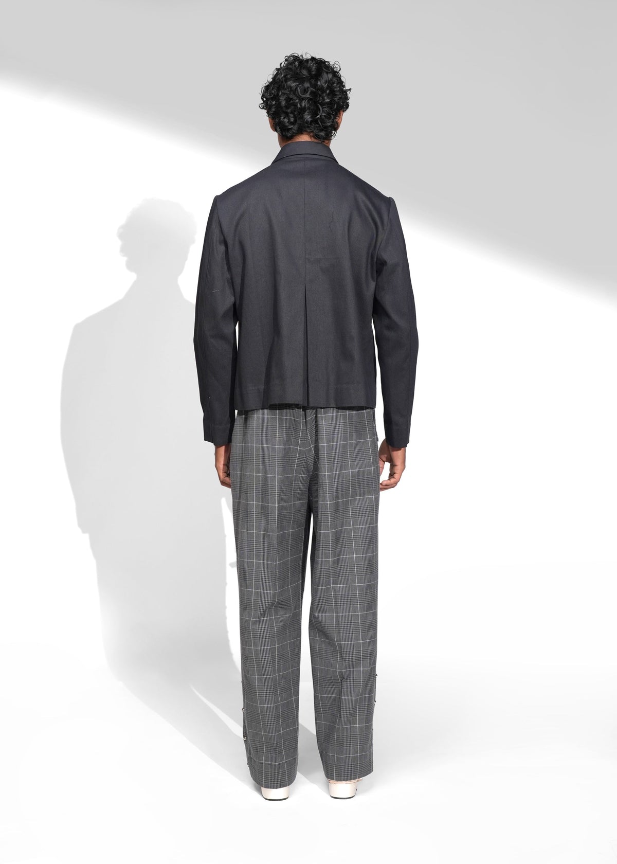 ROSANI The Dome jacket in black - cropped jacket with deep inverted box pleats, side view