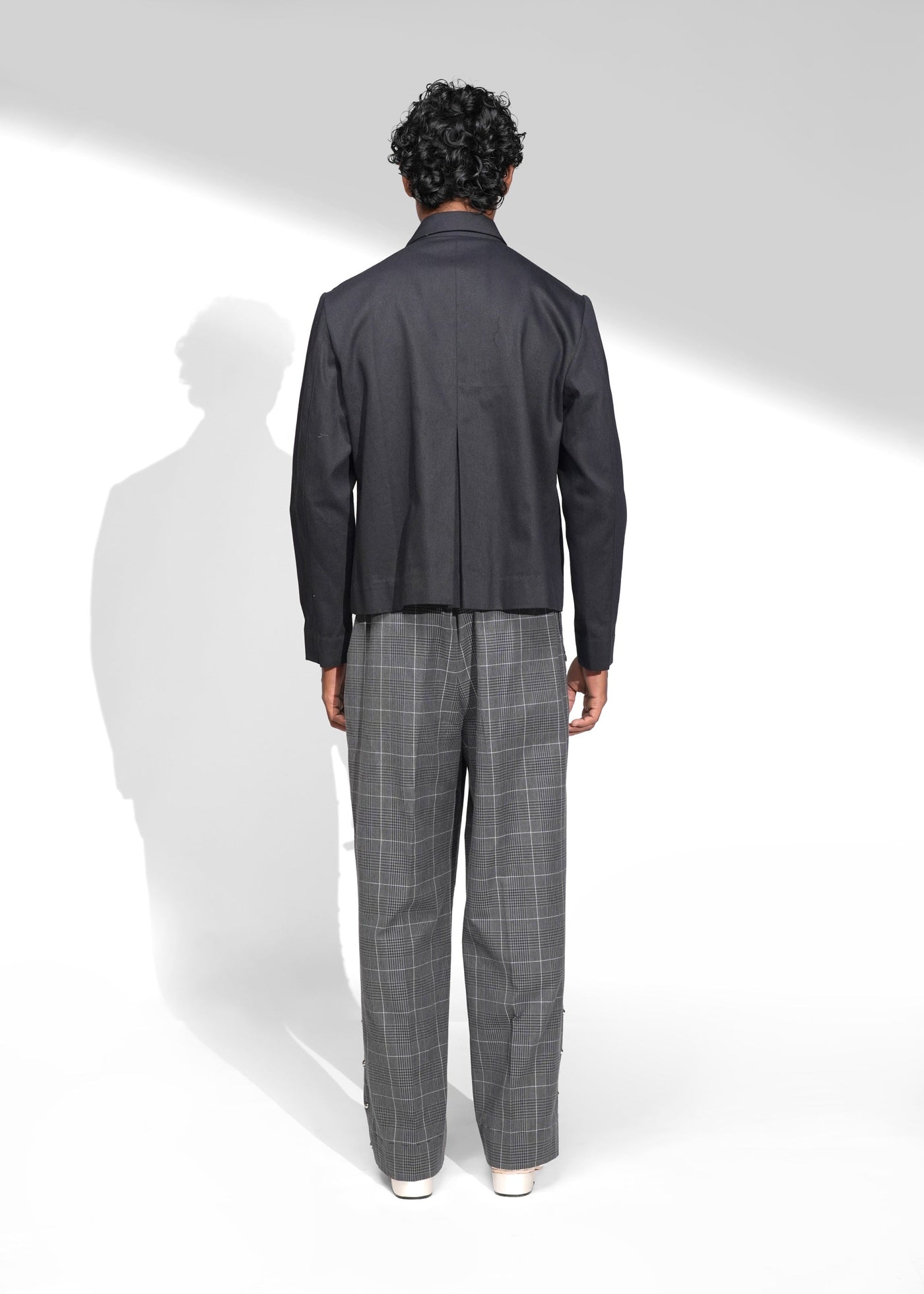 ROSANI The Dome jacket in black - cropped jacket with deep inverted box pleats, side view