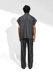 ROSANI The Ease shirt in black - sleeveless pinstripe shirt with metallic eyelet detail, front side view
