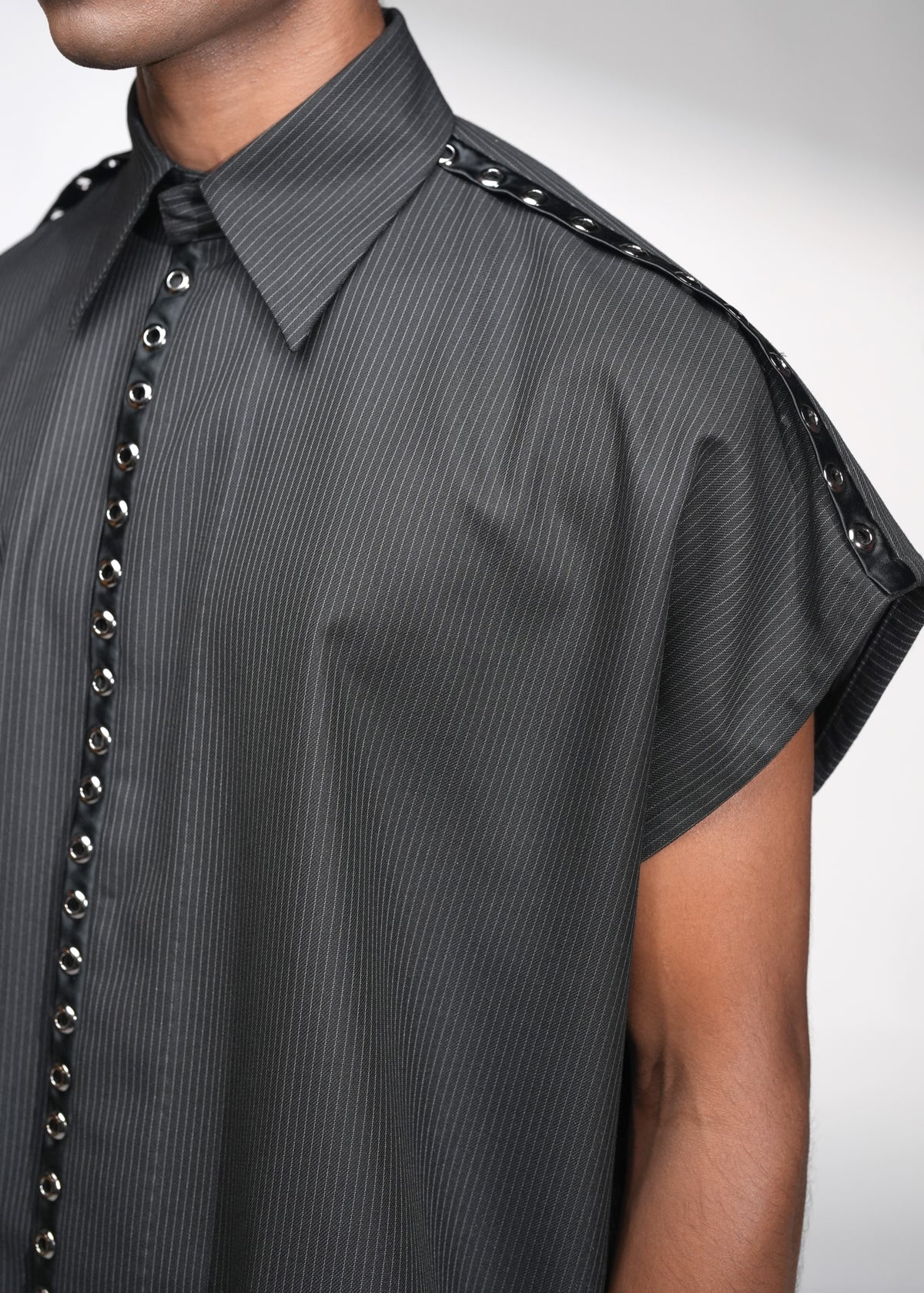 ROSANI The Ease shirt in black - sleeveless pinstripe shirt with metallic eyelet back yoke detail, back view