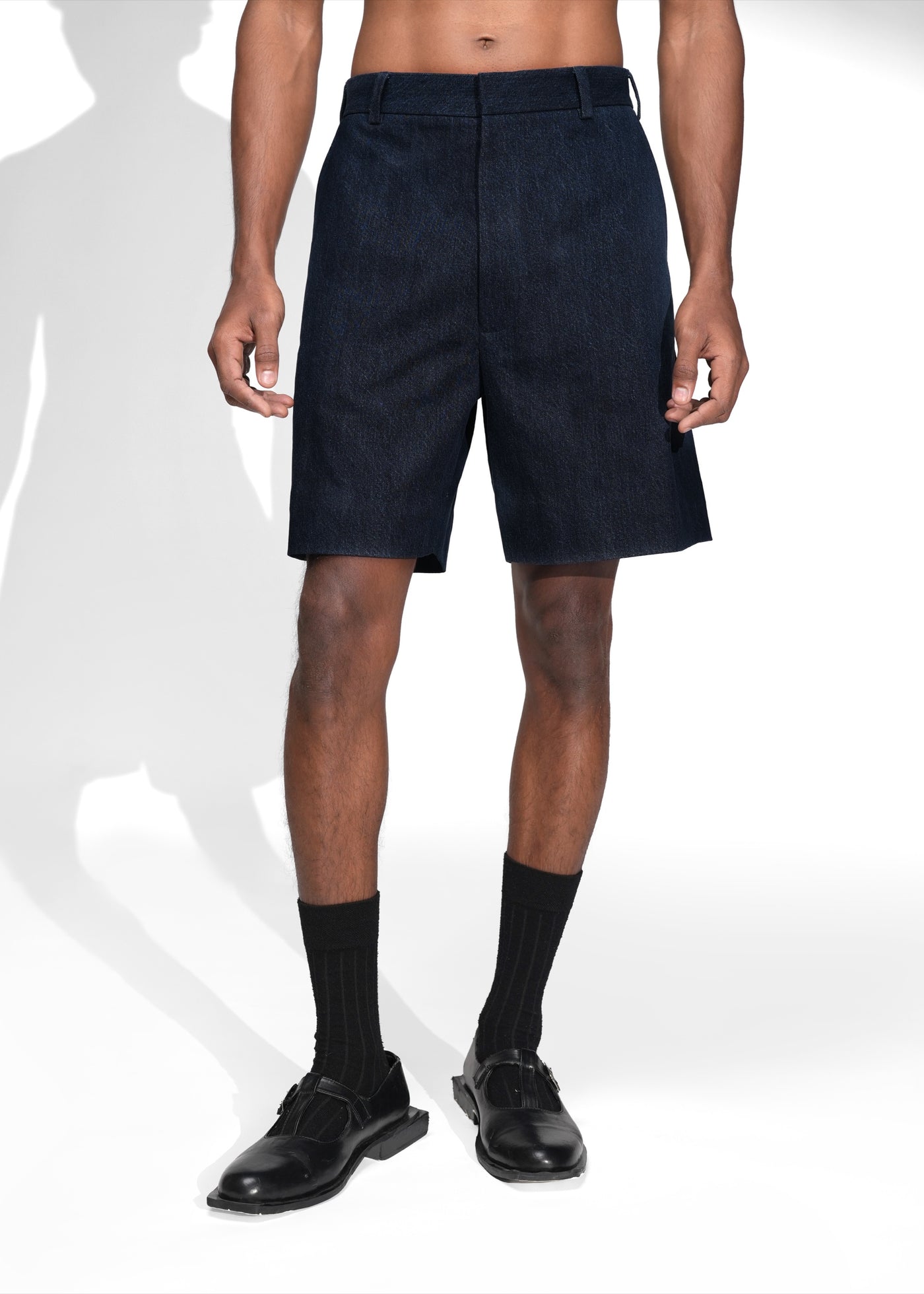 ROSANI The Echo shorts in midnight denim - straight-fit denim shorts with cross pockets, front view