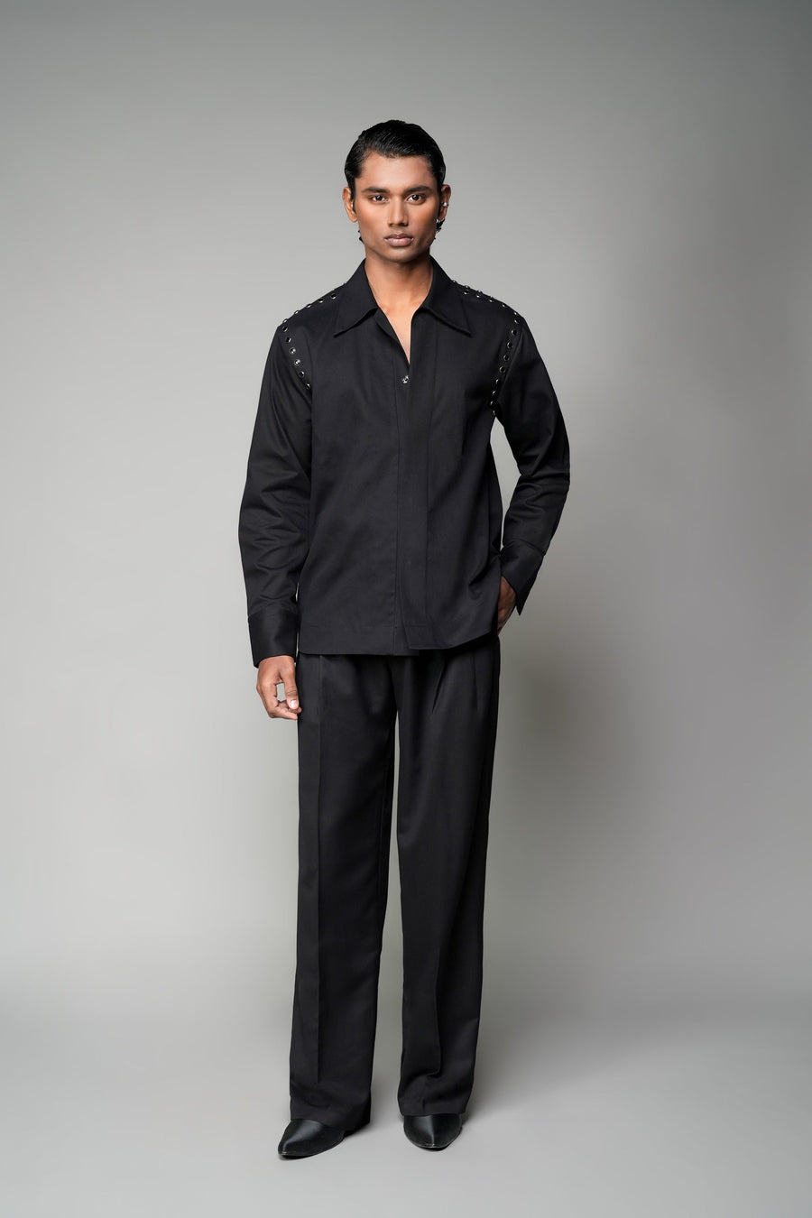 ROSANI The Eclipse shirt in black - full-sleeve shirt with metallic button detail at shoulder and armhole, front view