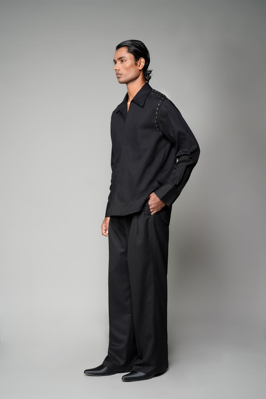 ROSANI The Eclipse shirt in black - metallic button shoulder and armhole detail, close-up