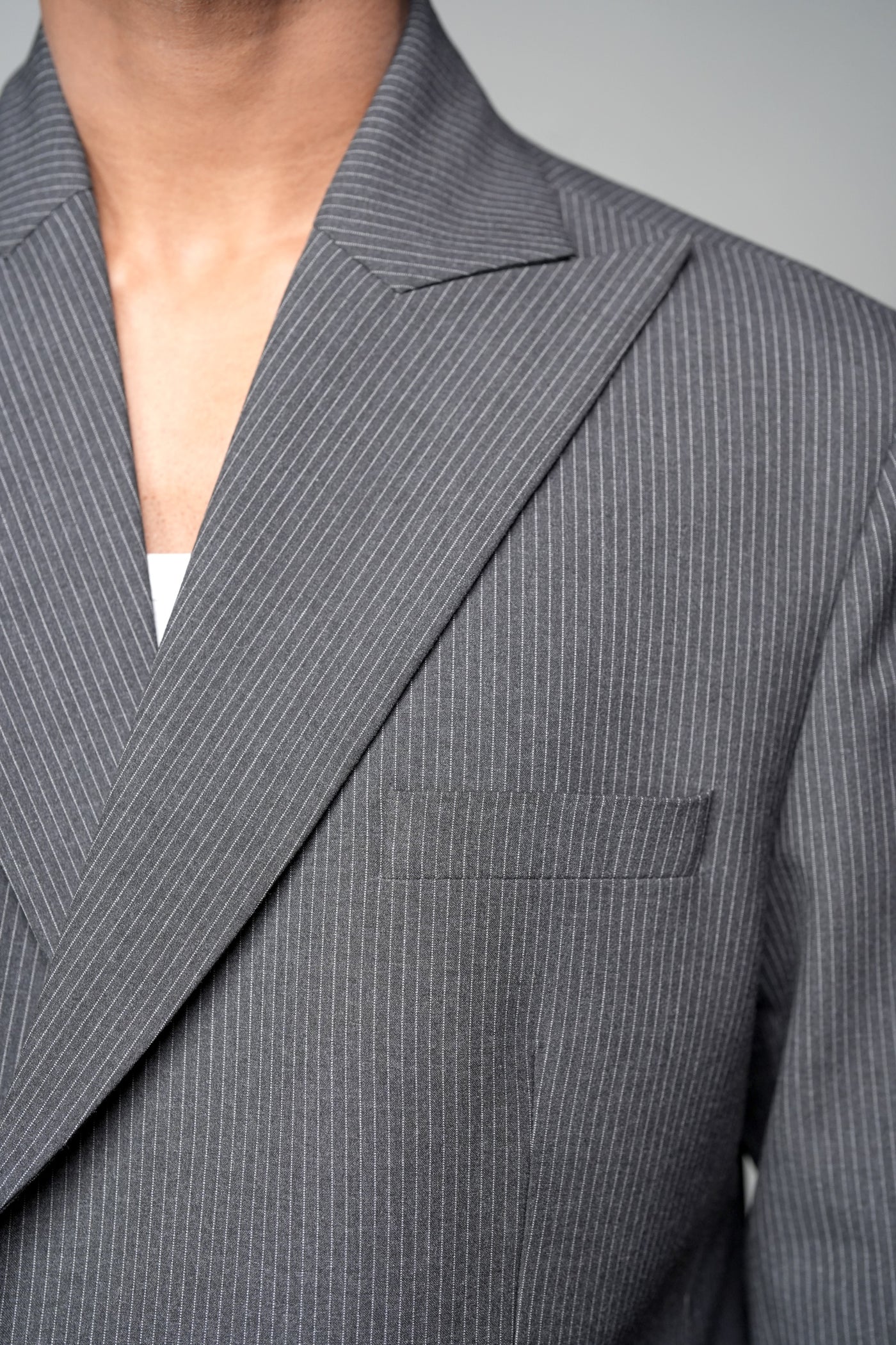 ROSANI The Grove blazer in grey - pinstripe shoulder-padded blazer, back view