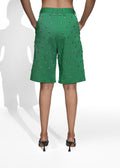ROSANI The Meadow shorts in shamrock green - metallic insert hem detail, close-up