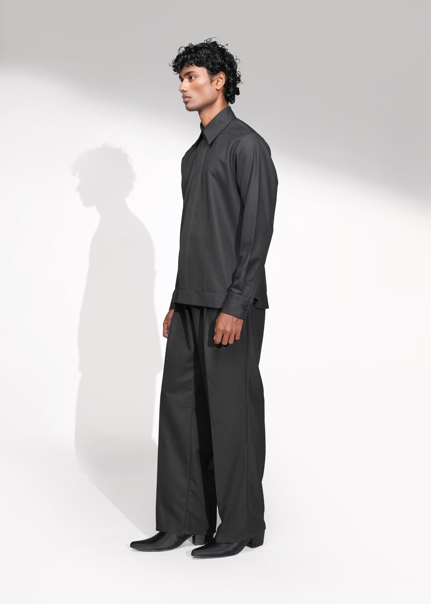 ROSANI The Nave shirt in black - concealed placket with fabric-covered button detail, close-up