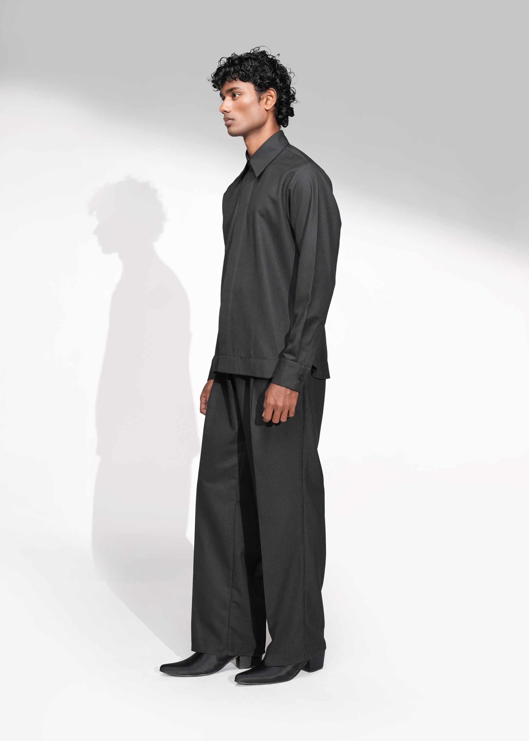 ROSANI The Nave shirt in black - concealed placket with fabric-covered button detail, close-up