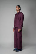 ROSANI The Pulse trouser in plum - high-waisted pleated trouser with broad belt, front side view