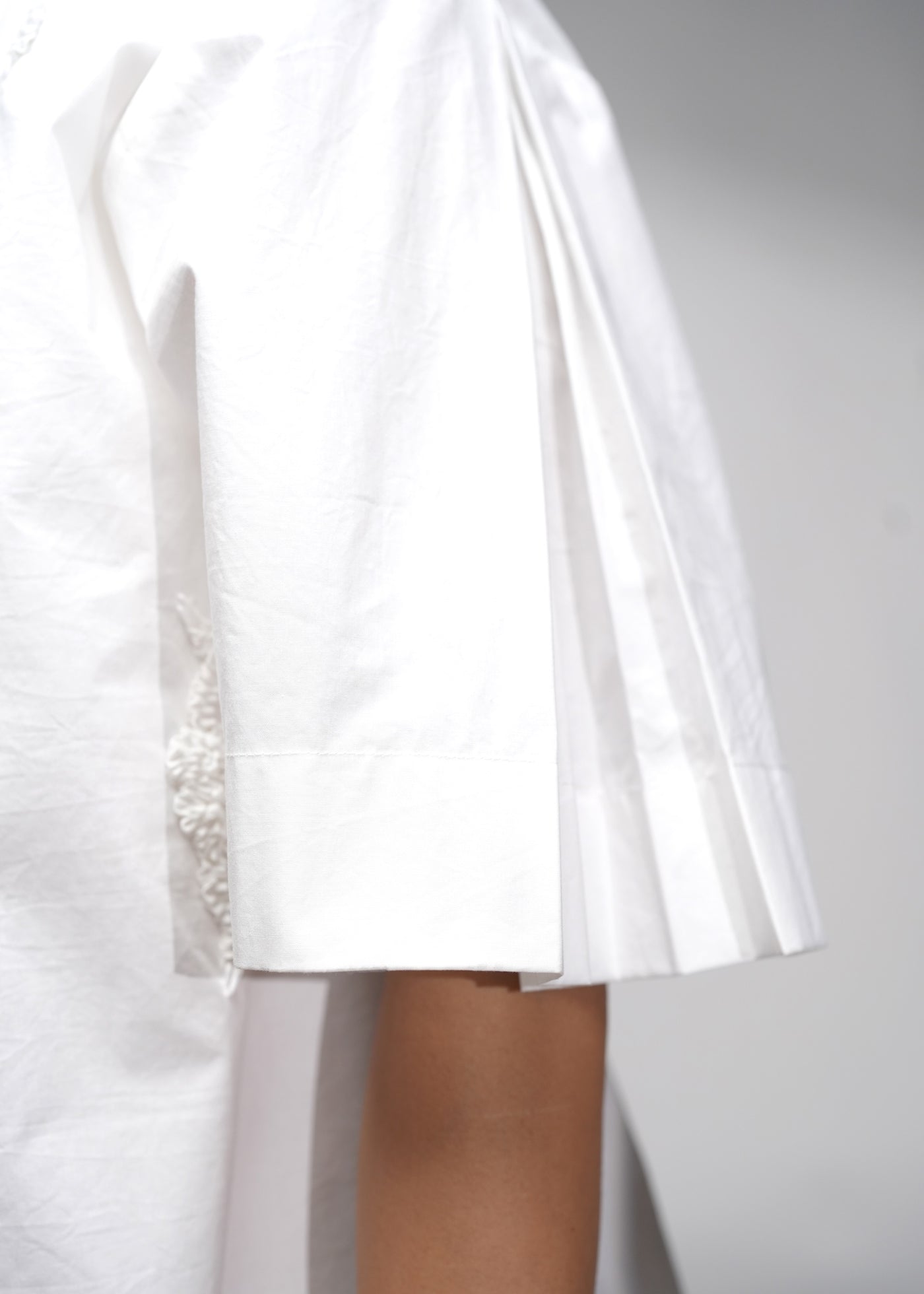 ROSANI The Portico dress in white - embroidered strip front detail, close-up