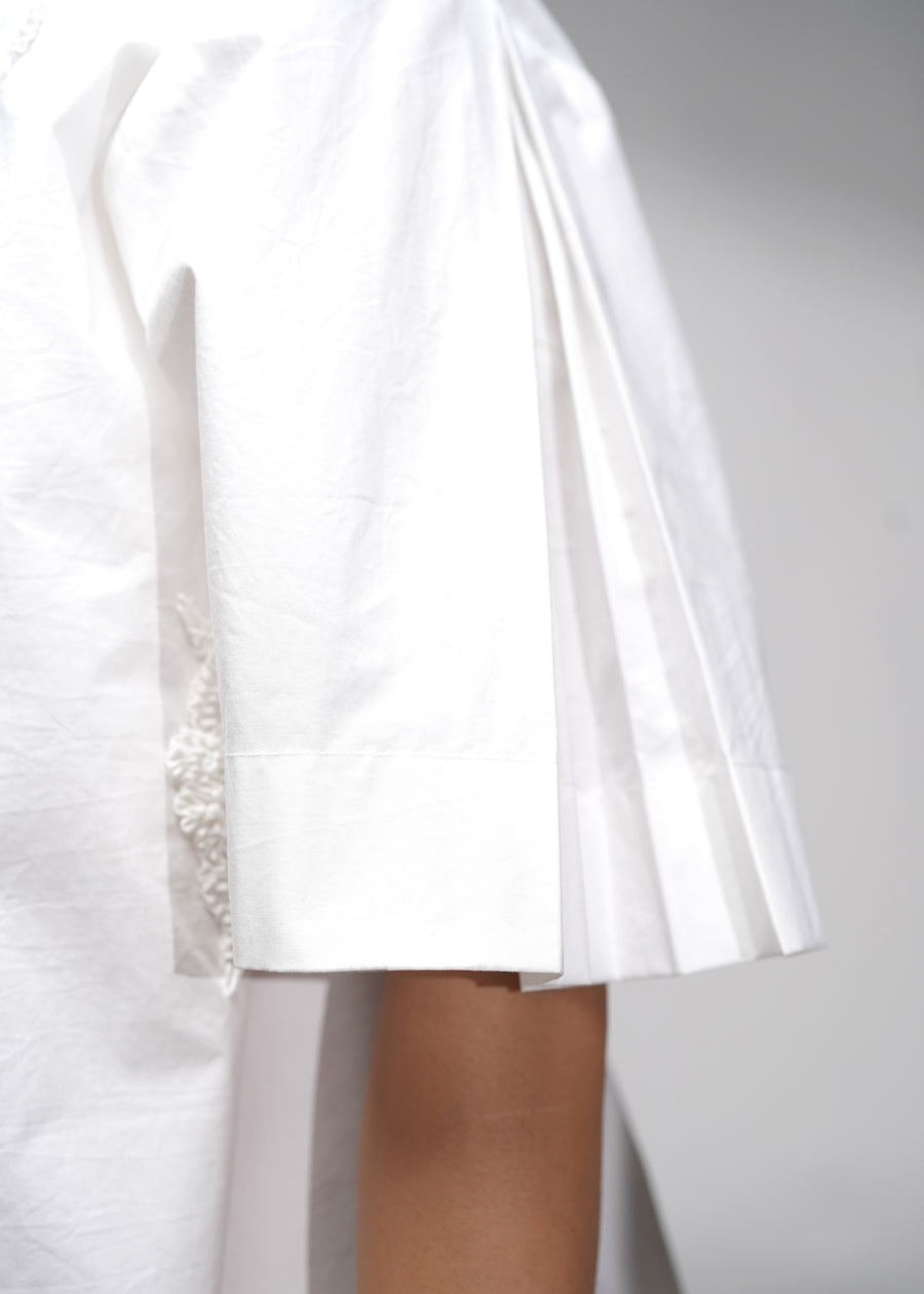ROSANI The Portico dress in white - embroidered strip front detail, close-up