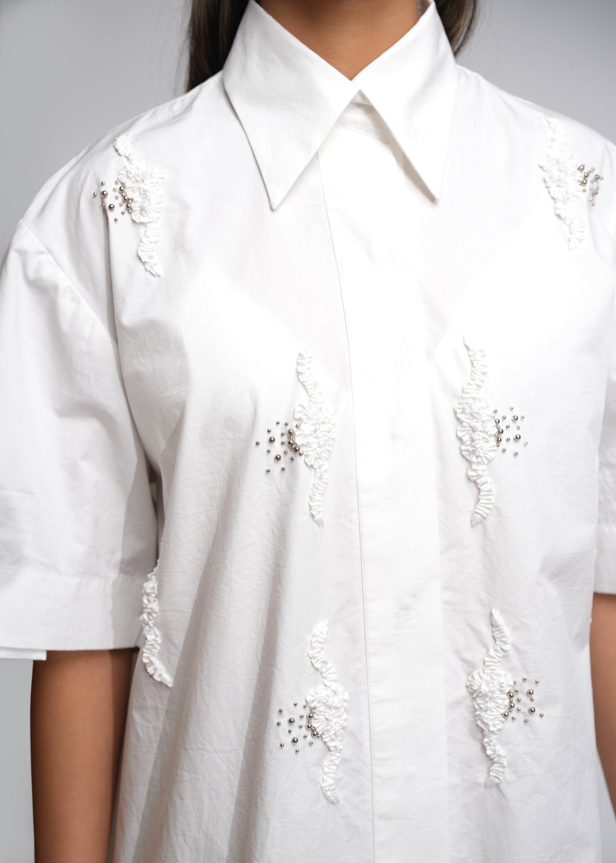 ROSANI The Portico dress in white - cotton shirt dress with pleated back and embroidered strip detail, back view