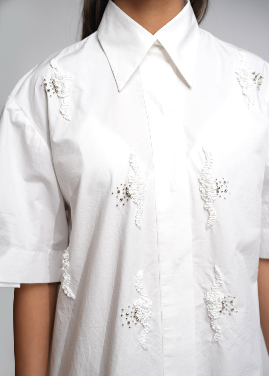 ROSANI The Portico dress in white - cotton shirt dress with pleated back and embroidered strip detail, back view