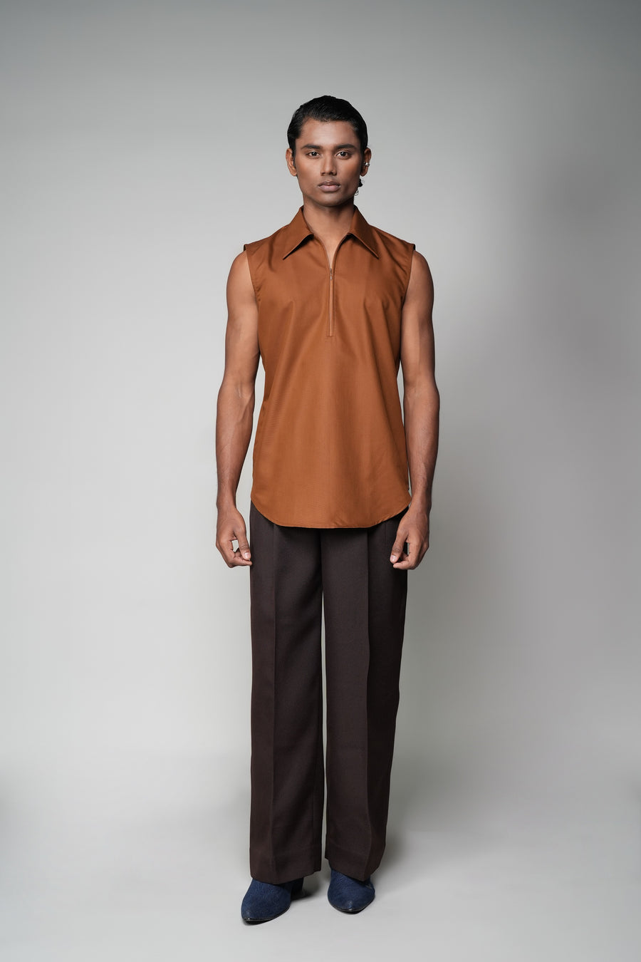 ROSANI The Root shirt in rust - sleeveless vest with deep apple-cut hem and front invisible zip, front view