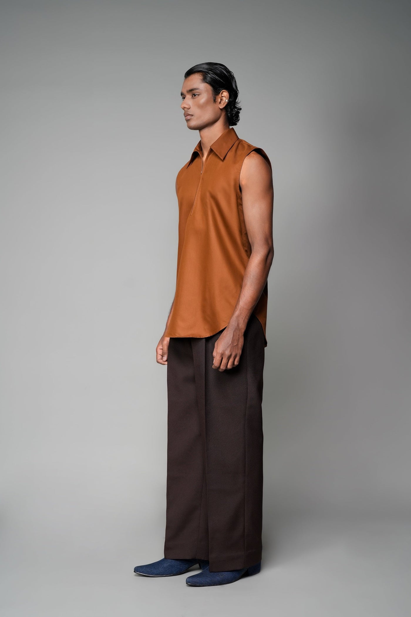 ROSANI The Root shirt in rust - sleeveless vest with deep apple-cut hem and front invisible zip, front side view