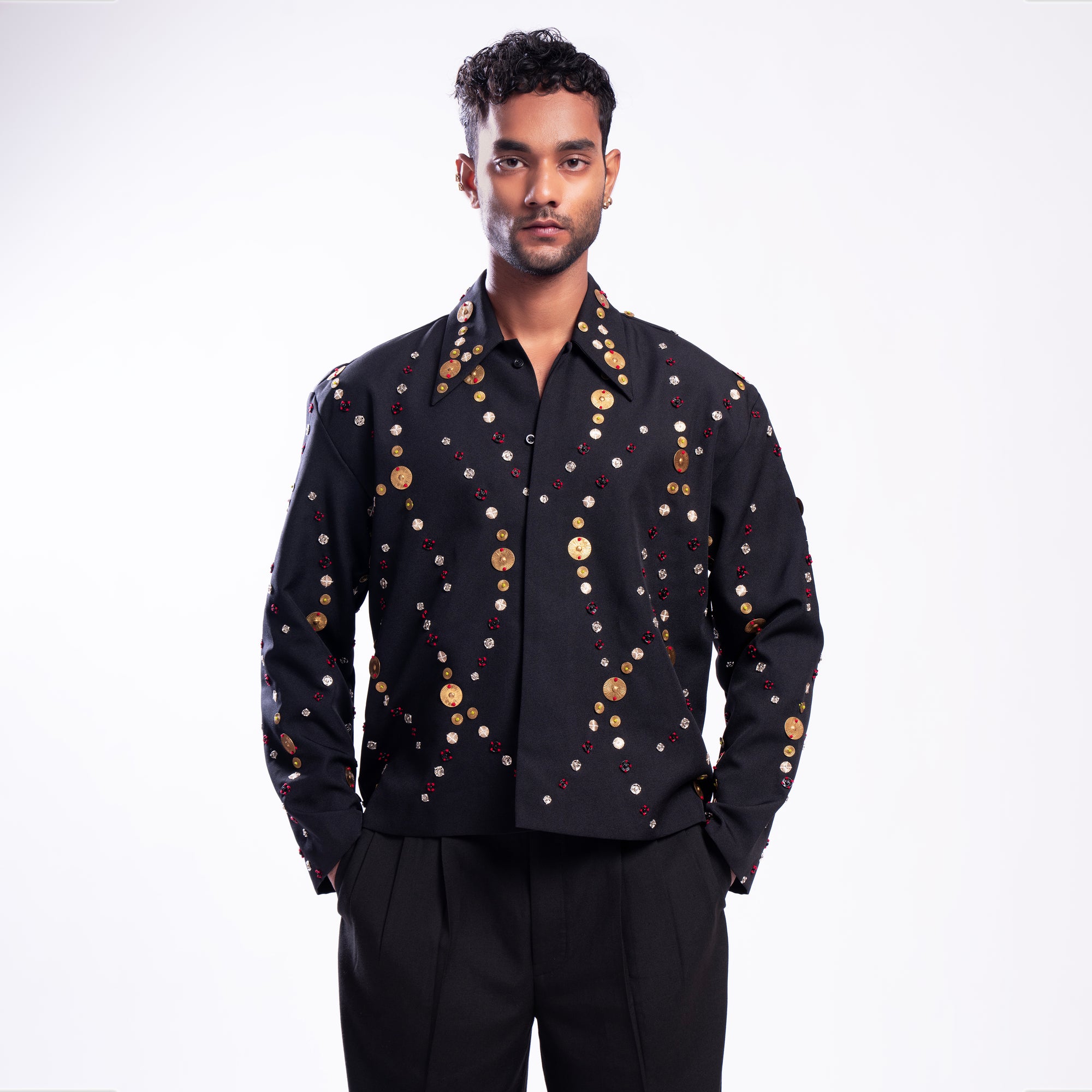 ROSANI The Ameus jacket, front view. All-over Auratus brass disc and metallic thread hand embroidery. DYMENSION collection.
