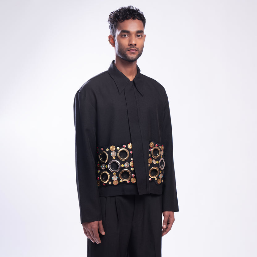 ROSANI The Arsoya jacket in black, front view. Relaxed fit with front zip and wide flap. DYMENSION collection.
