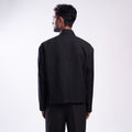 ROSANI The Arsoya jacket in black, back view. DYMENSION collection.