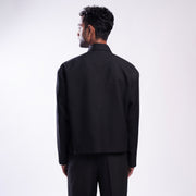 ROSANI The Arsoya jacket in black, back view. DYMENSION collection.