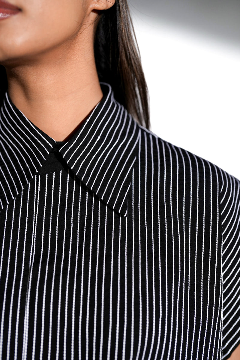 ROSANI The Auralis shirt in black - oversized sleeveless collared shirt with fine hand embroidered vertical stripes and clean straight hem, detail view