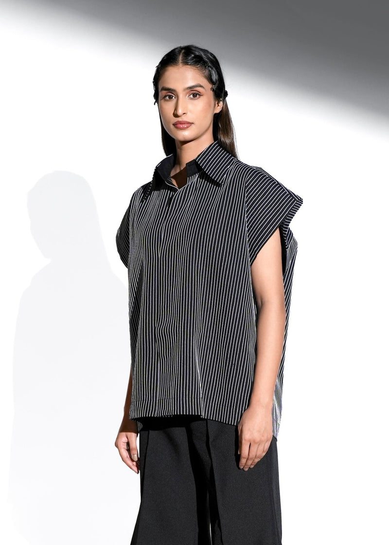ROSANI The Auralis shirt in black - oversized sleeveless collared shirt with fine hand embroidered vertical stripes and clean straight hem, front side view