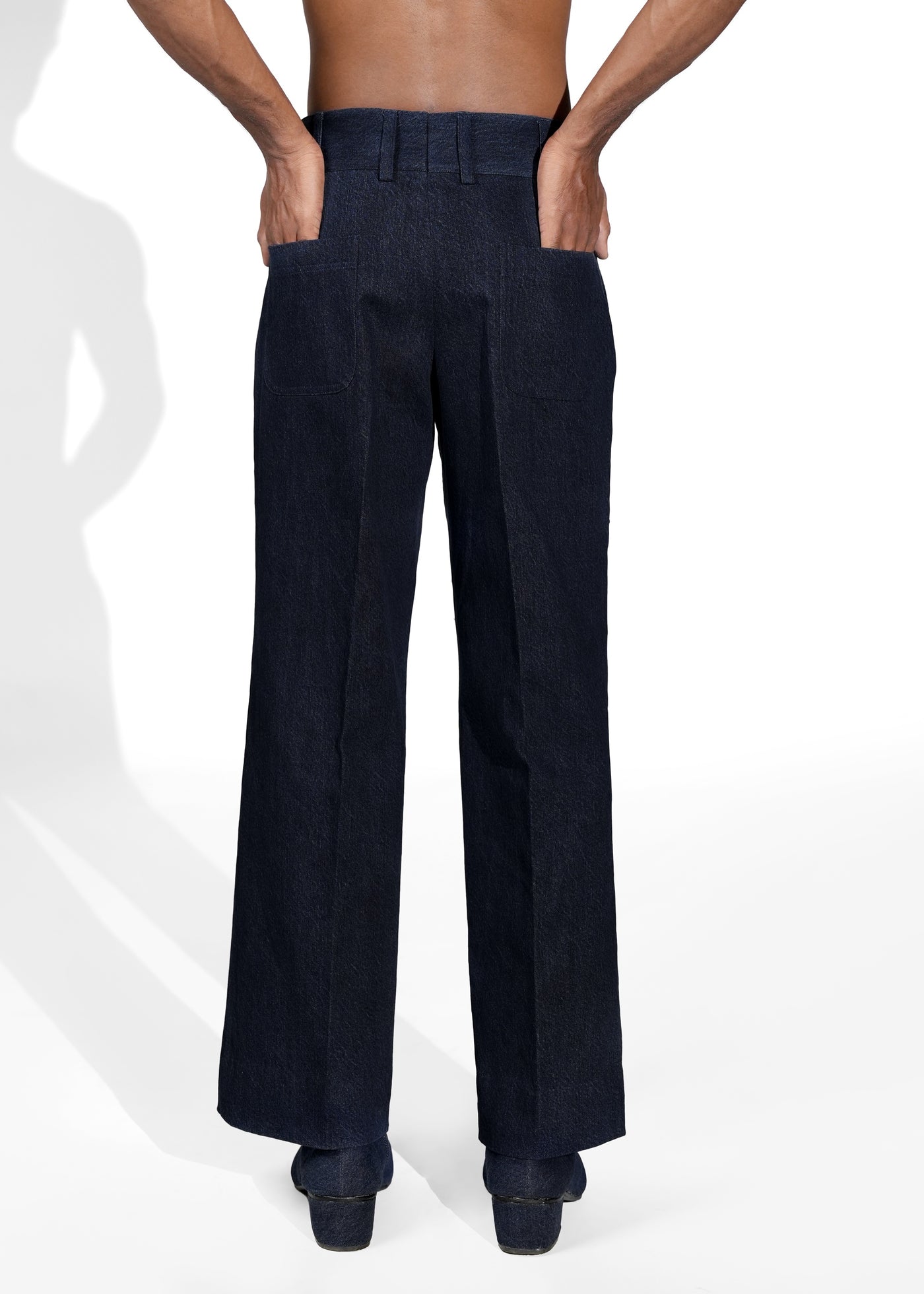 ROSANI The Axis trouser in midnight denim - clean front seam and pocket detail, close-up