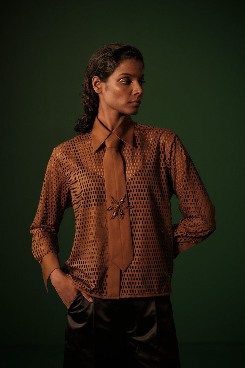 ROSANI The Celara shirt in rust brown - laser-cut button-up shirt with pointed collar, long sleeves and relaxed fit, front editorial view