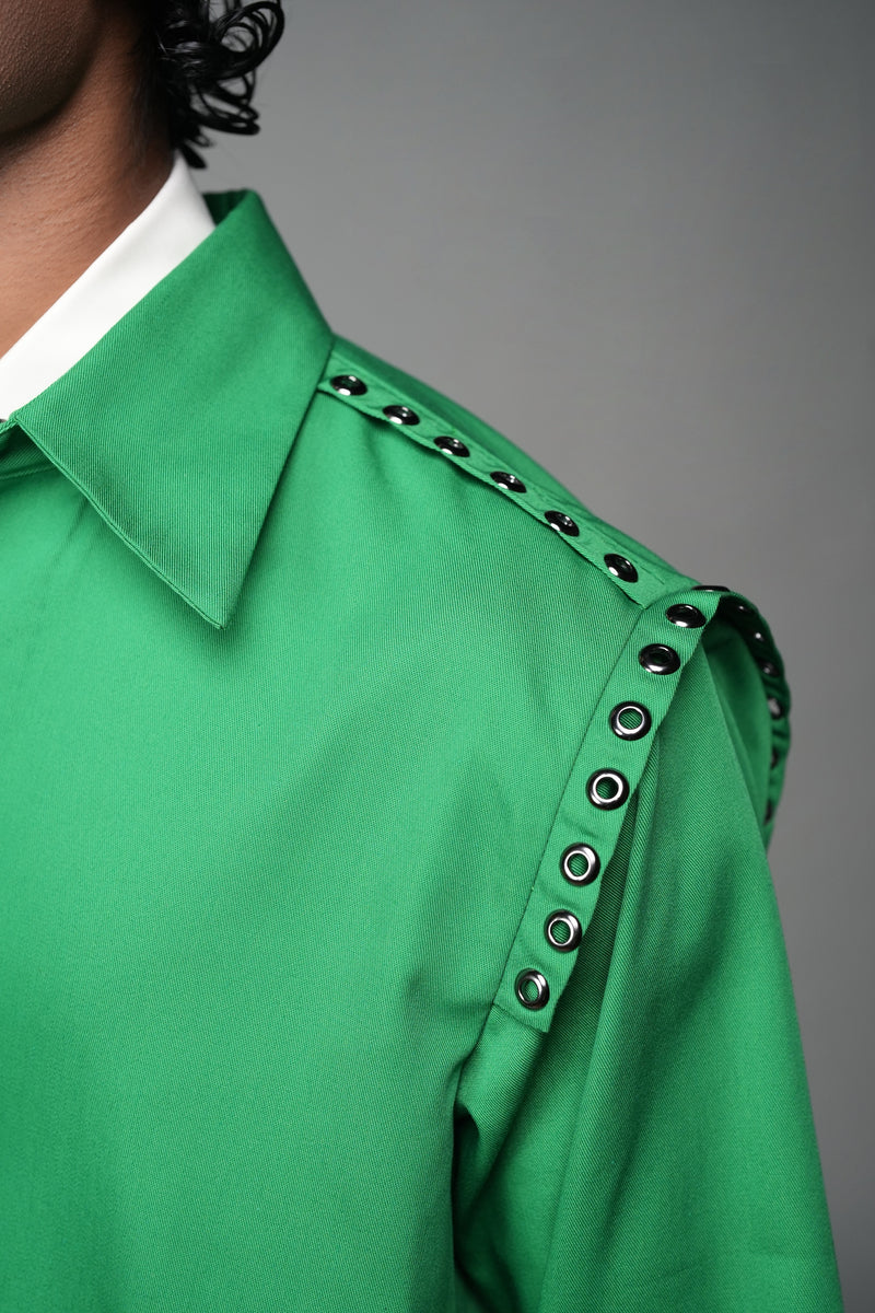 ROSANI The Chamber shirt in green - close-up of shoulder strap with metal eyelet stud detailing and pointed collar, detail view