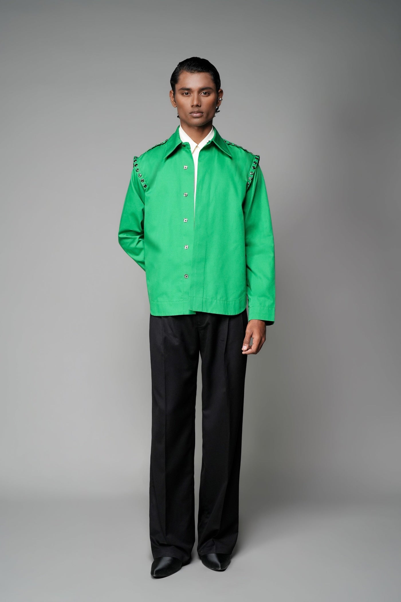 ROSANI The Chamber shirt in green - long-sleeve button-up shirt with classic collar and studded shoulder detailing, front view