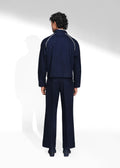 ROSANI The Cloister jacket in midnight denim - cropped raglan-sleeve jacket with metallic seam accents, back view