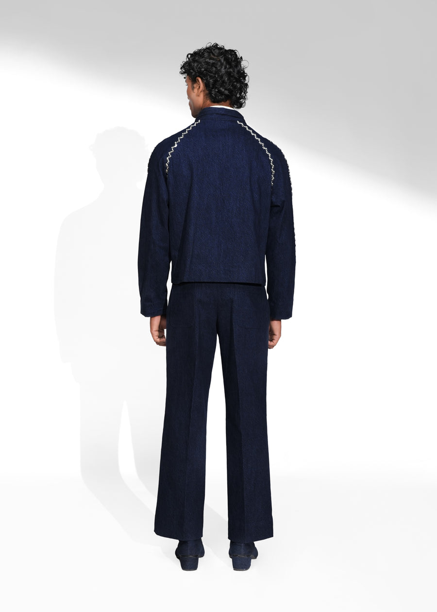ROSANI The Cloister jacket in midnight denim - cropped raglan-sleeve jacket with metallic seam accents, back view