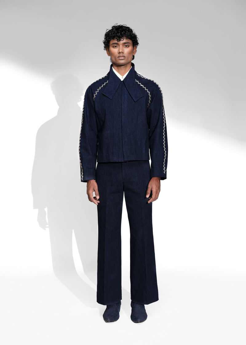 ROSANI The Cloister jacket in midnight denim - cropped denim jacket with raglan sleeves and metallic embellished detailing along the seams, front view