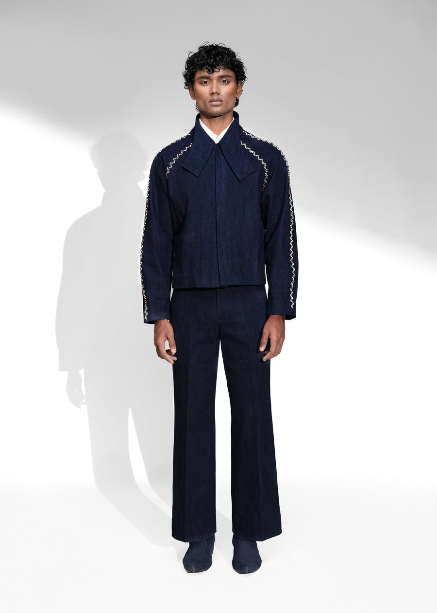 ROSANI The Cloister jacket in midnight denim - cropped raglan-sleeve jacket with metallic seam accents, front view