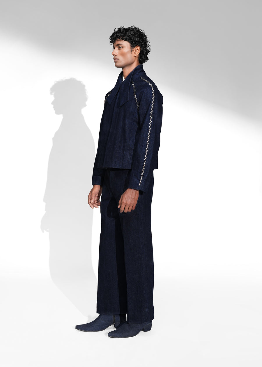 ROSANI The Cloister jacket in midnight denim - cropped raglan-sleeve jacket with metallic seam accents, front side view