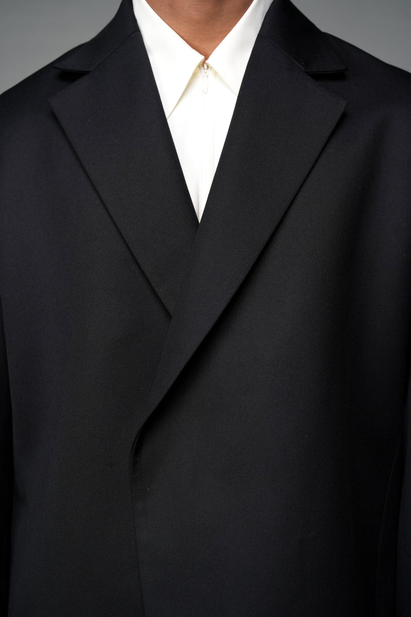 ROSANI The Column blazer in black - sharp-shouldered tailored blazer with wrap front and clean peak lapel, styled with The Eden trouser, detail view