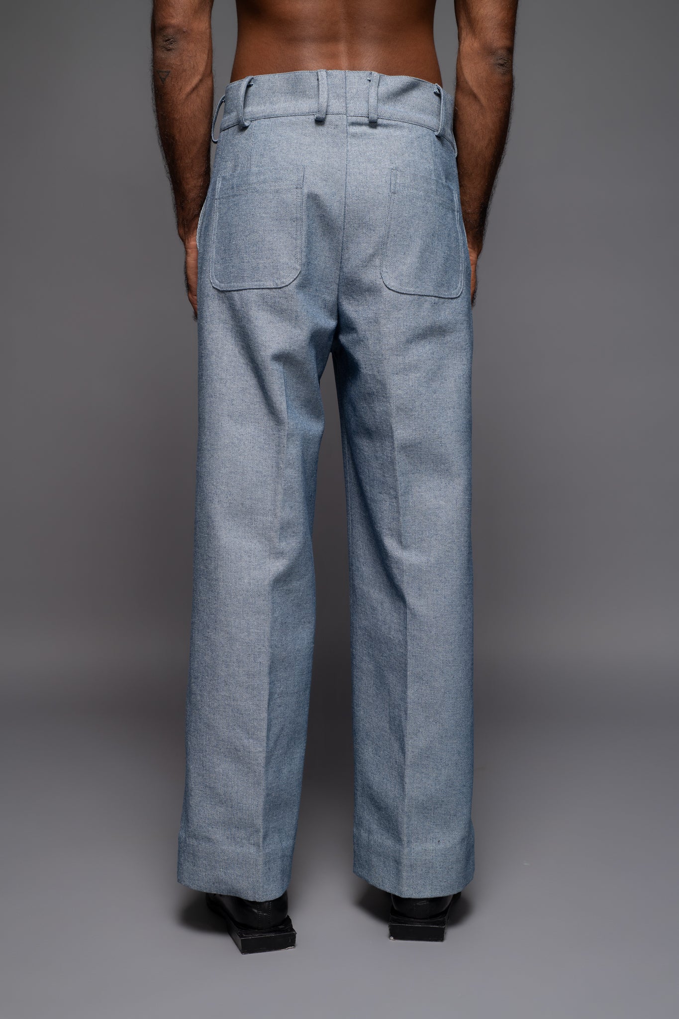 ROSANI The Cucuk trouser in light denim - straight-leg embellished denim trousers with thorn-inspired embroidery along the leg, back view