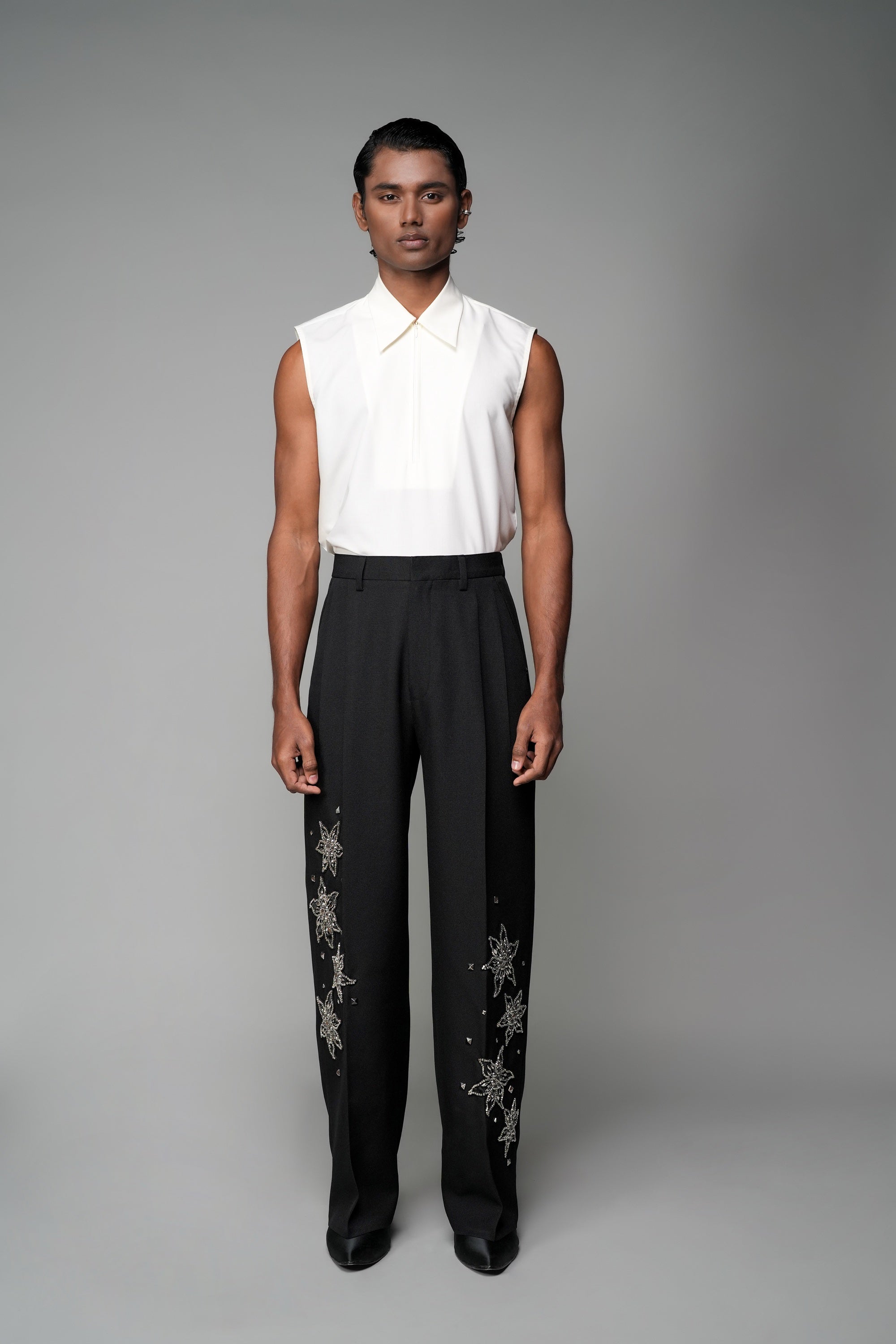 ROSANI The Eden trouser in black - mid-rise tailored trousers with straight-leg fit and metallic embroidered stars on the legs, front view