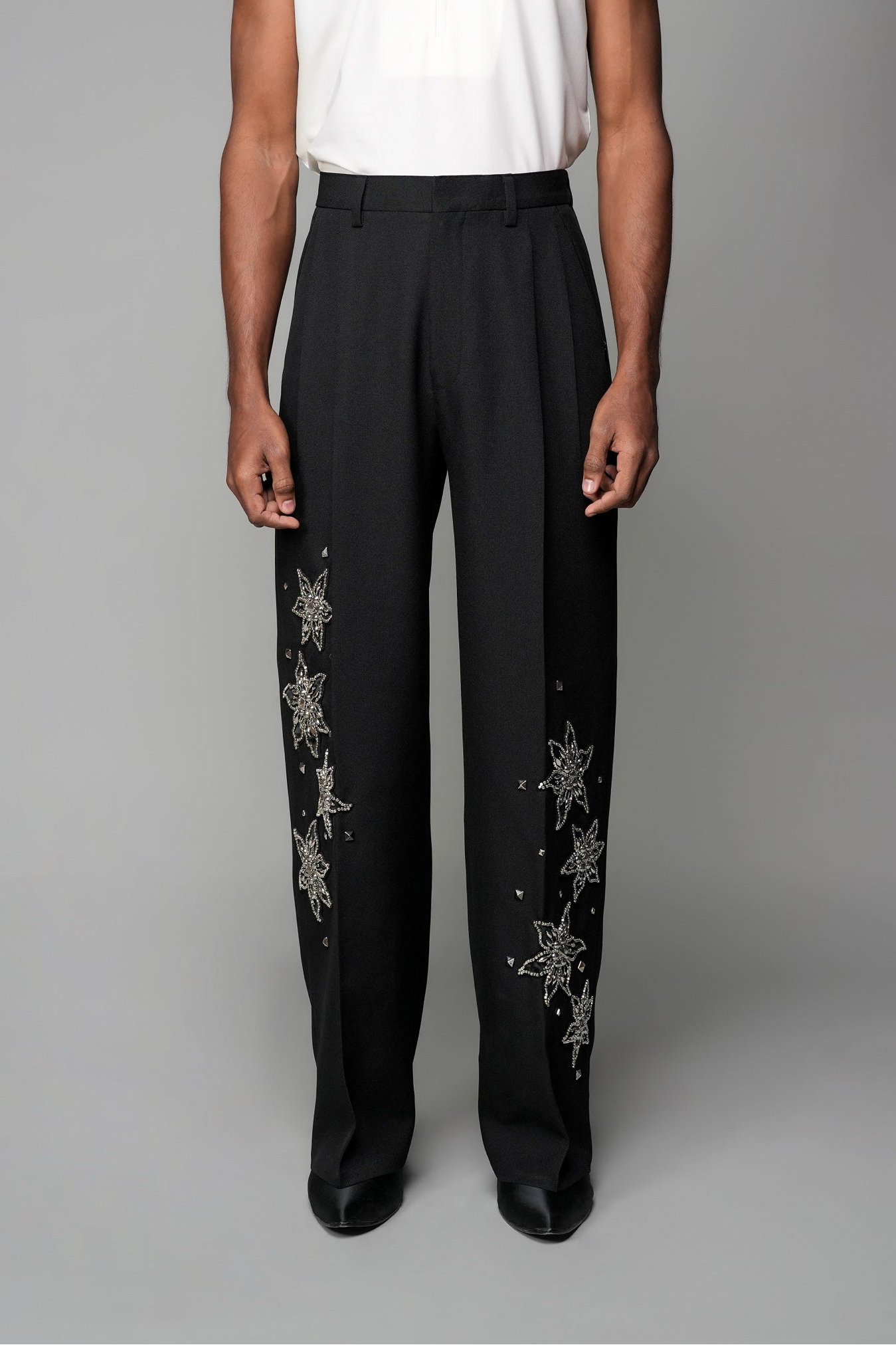ROSANI The Eden trouser in black - mid-rise tailored trousers with straight-leg fit and metallic embroidered stars on the legs, front view