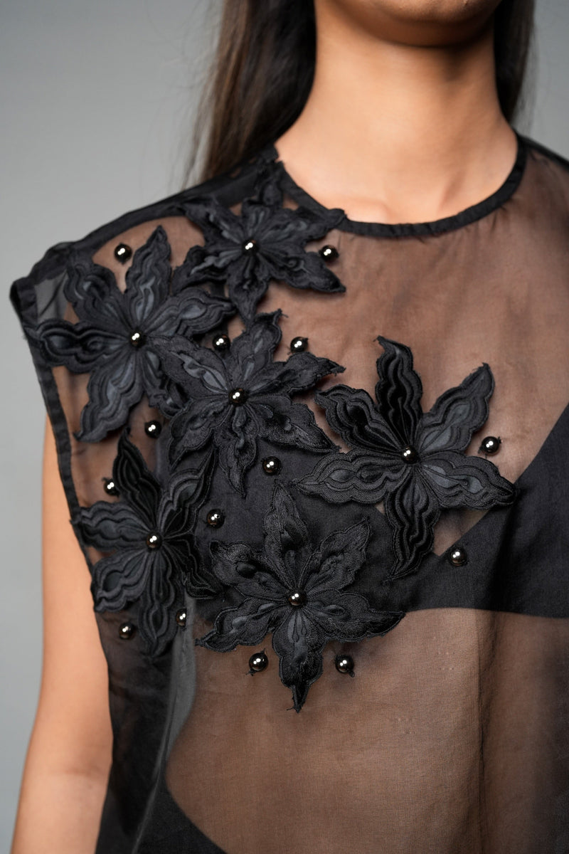 ROSANI The Fern top in black - sheer sleeveless top with floral applique detailing and asymmetric placement, detail view
