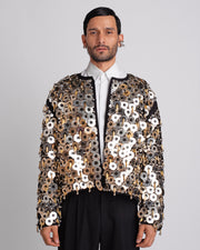 ROSANI The Jase jacket in black and silver. Fully hand-embroidered showstopper jacket with metallic discs, beads and tube detailing. ANIMA and ANIMUS collection, front view.