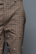 ROSANI The Katu trouser in brown check - relaxed-fit checked trousers with metallic inserts and applique back pockets, front view