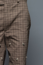 ROSANI The Katu trouser in brown check - relaxed-fit checked trousers with metallic inserts and applique back pockets, front view